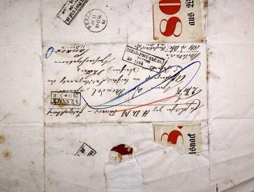 Letter with handwriting and stamps.
