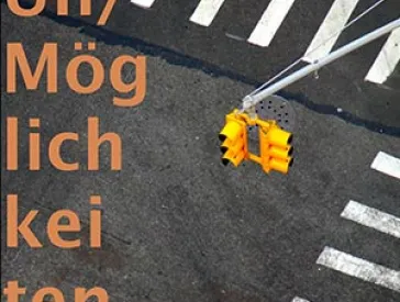 Schriftzug „Un/Möglichkeiten“ auf Zebrastreifen
