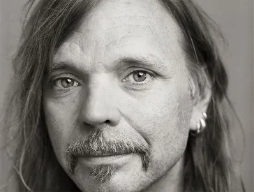 A man with long hair: The artist named Typex.