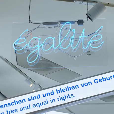 Exhibition view showing the neon lettering "&eacute;galit&eacute;".