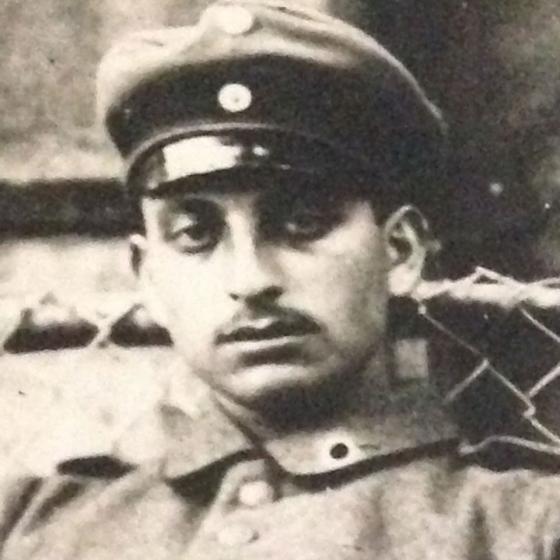 Black and white portrait of a soldier.