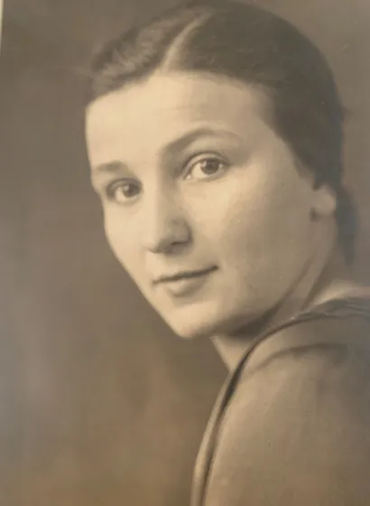  Sepia-colored portrait of a woman.