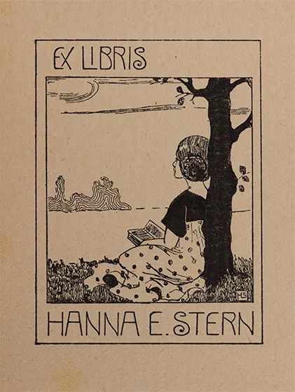Brownish colored paper, on which a print can be seen in black ink: A woman leaning against a tree and holding a book in her hand. Lettering above: ExLibris. Lettering underneath: Hanna E. Stern.