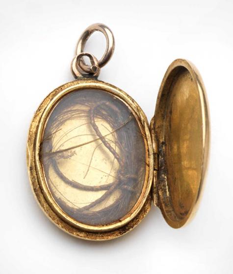 Open locket with hair curl