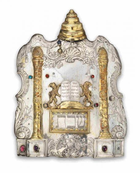Torah shield made of stone decorated with gold and colorful stones