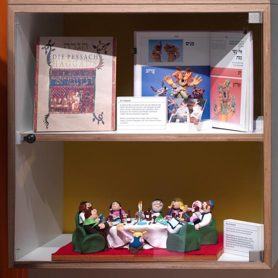 Children’s Haggadah and clay figurines on Passover