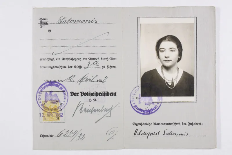 Old driver's license. The black-and-white passport photo shows a middle-aged woman.