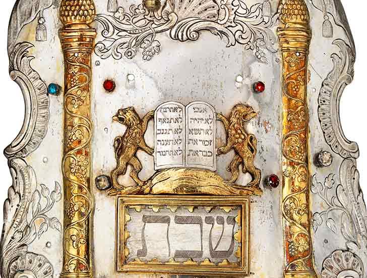 Silver Torah shield with gilded columns and lions holding law tablets