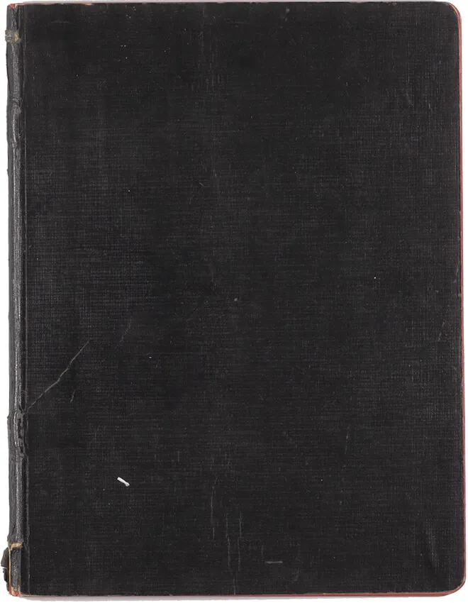 A worn notebook with a dark-brown cover