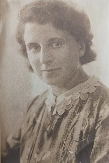  Sepia-colored portrait of a woman with chin-length hair.