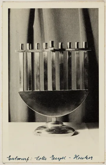  Black and white photograph of a Hanukkah candelabrum.