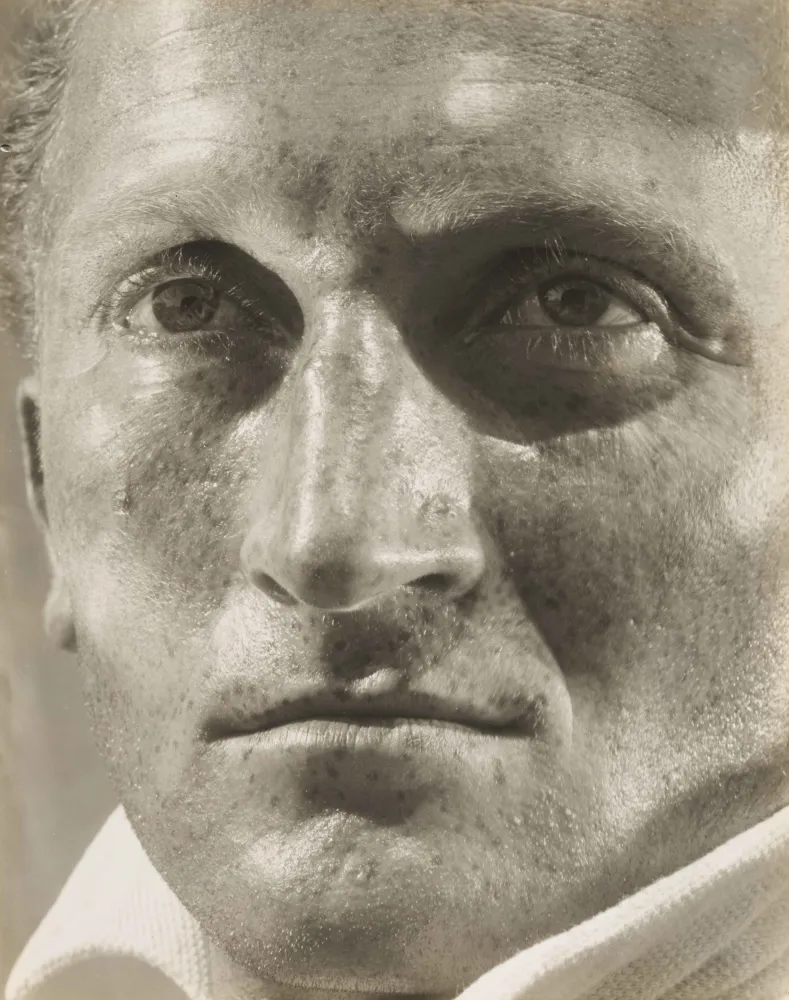 The picture shows the face of a man.