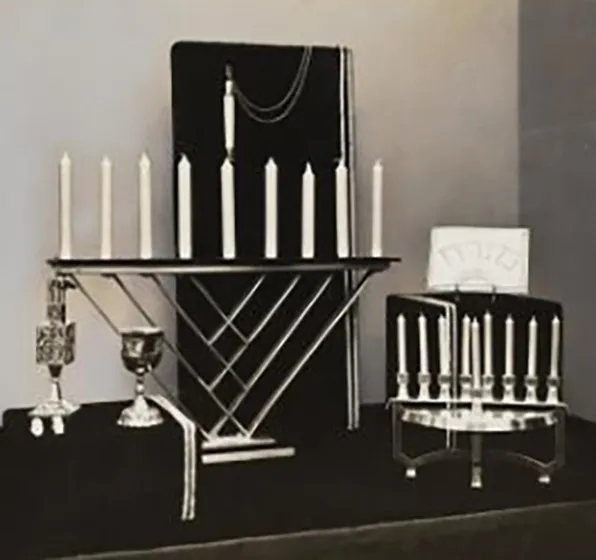 On the left you can see a large chanukka menorah with candlesticks, to its right a smaller one.