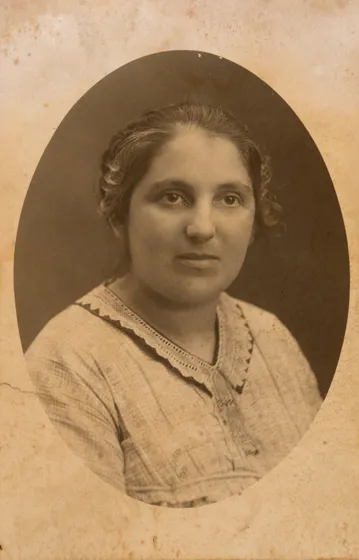  Sepia-colored portrait of a woman.