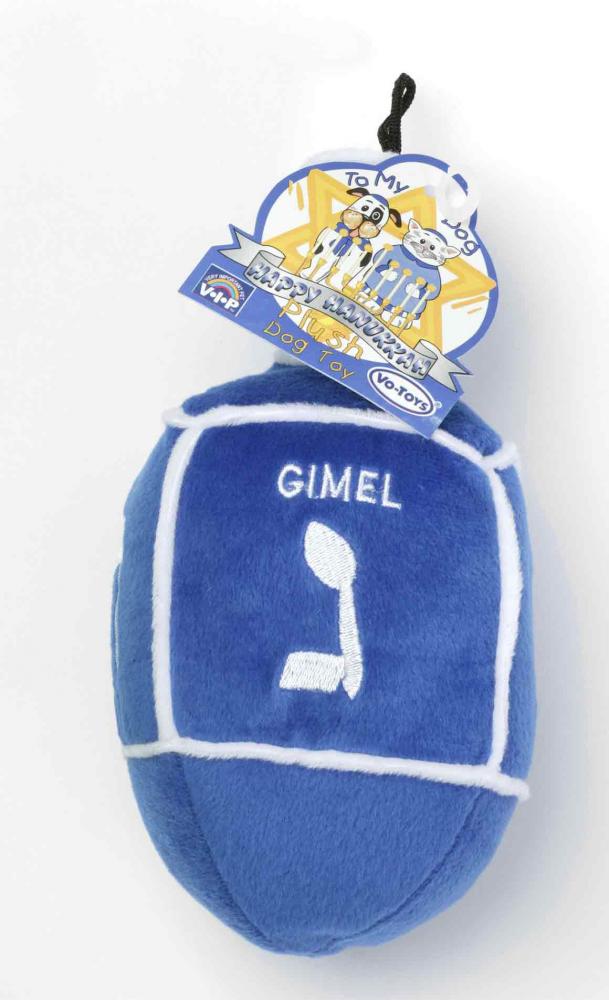 Blue dreidel made of stuffed plush from the brand V.I.P. (VERY IMPORTANT PET); the Hebrew letters nun, gimmel, he, and shin are embroidered on the sides 