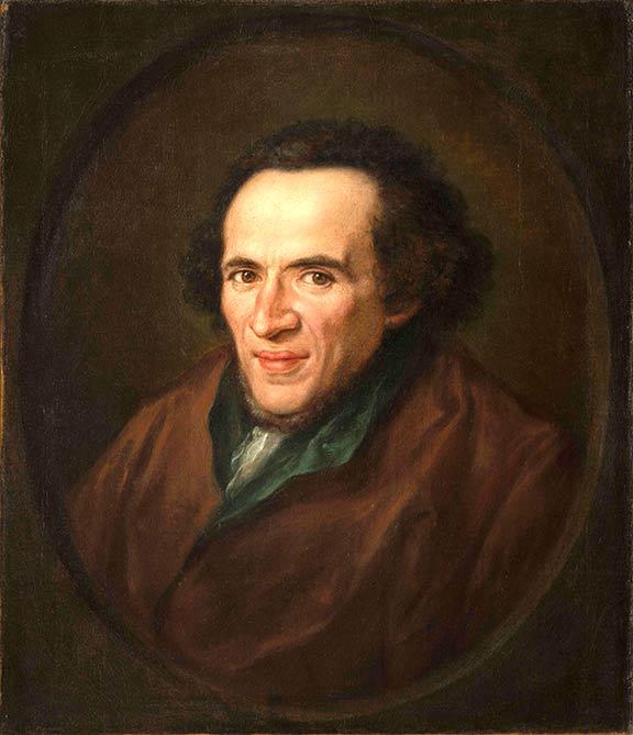 Oil painting: portrait of Moses Mendelssohn depicted in half profile in a painted oval frame, eyes are directed to the viewers. 