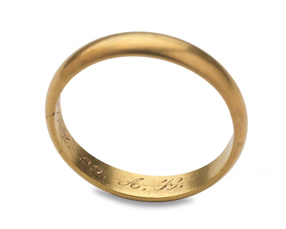 Golden ring with inscription "21.2.09 A. K."