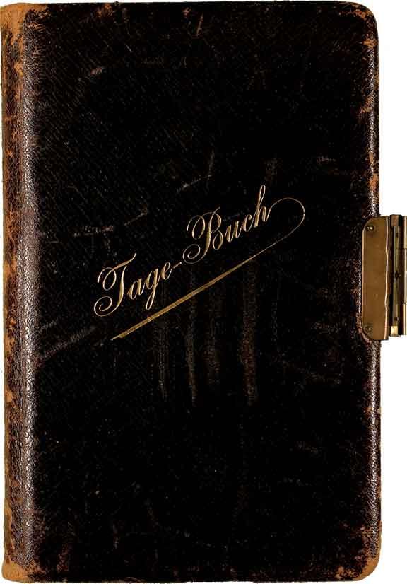 Worn, leather-bound booklet. Diagonally across the cover is the golden lettering “Diary”, on the right side is a lock