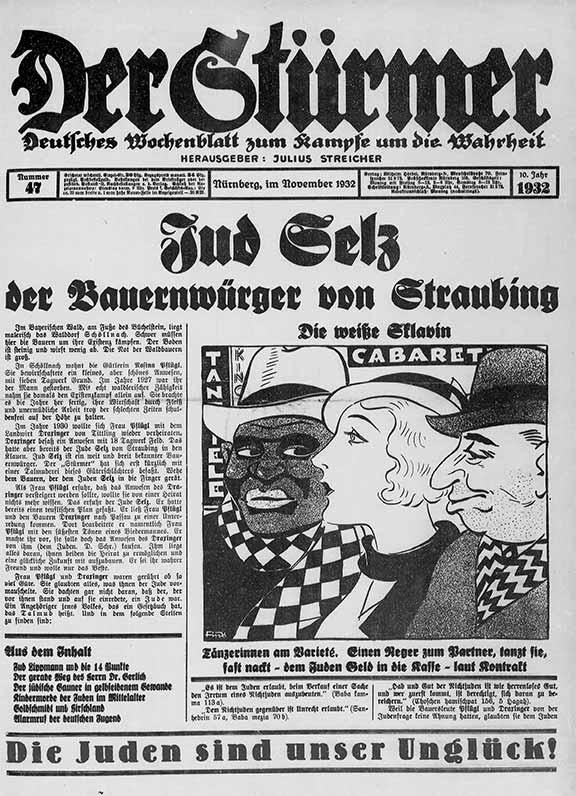 Cover of the hate sheet Der Stürmer with a racist, antisemitic caricature and Heinrich von Treitschke’s antisemitic slogan “Jews are our misfortune!” at the bottom.