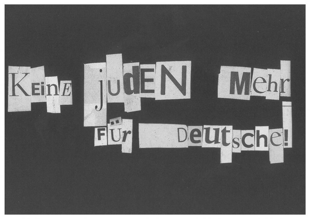 Postkarte mit dem Slogan »Keine Juden mehr für Deutsche!« aus ausgeschnittenen und aufgeklebten Buchstaben