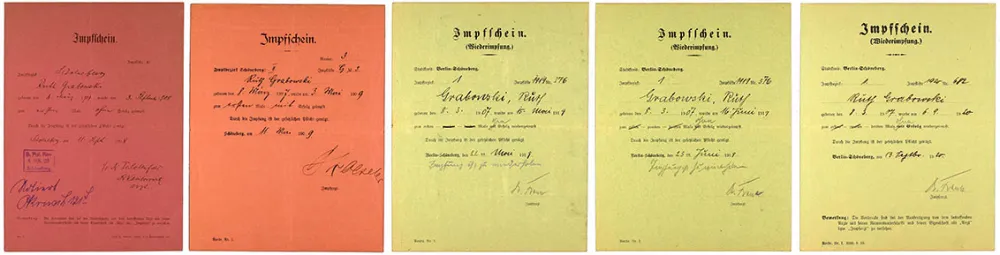 Five vaccine certificates, two of them red and three green