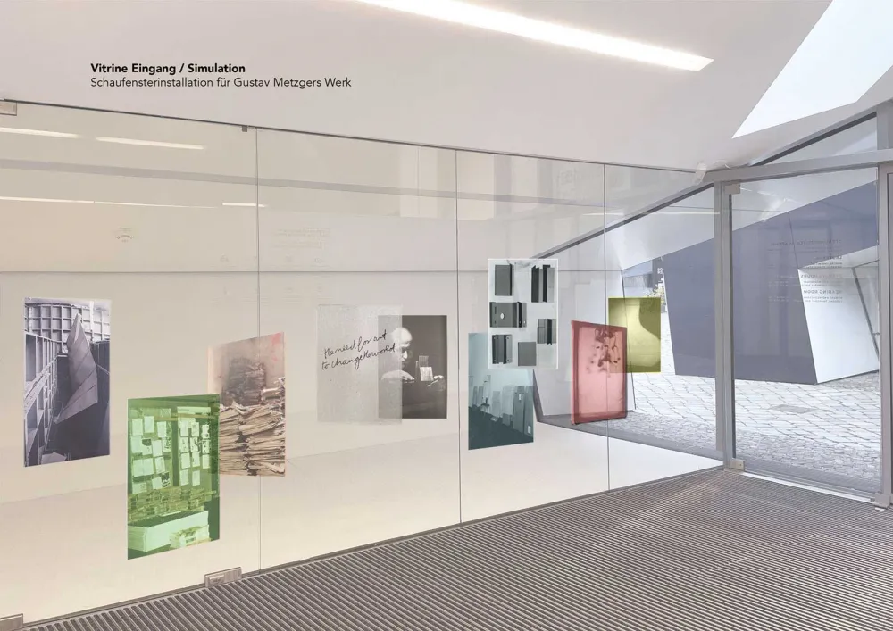 Floor-to-ceiling display case with different format and color pictures.