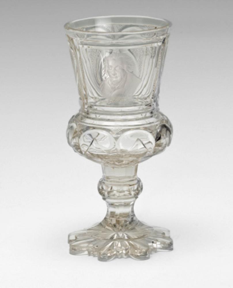 Transparent glass trophy with a bust portrait of Moses Mendelssohn engraved into the bell-shaped upper part of the goblet, which also bears his engraved signature and 1786, the year of his death