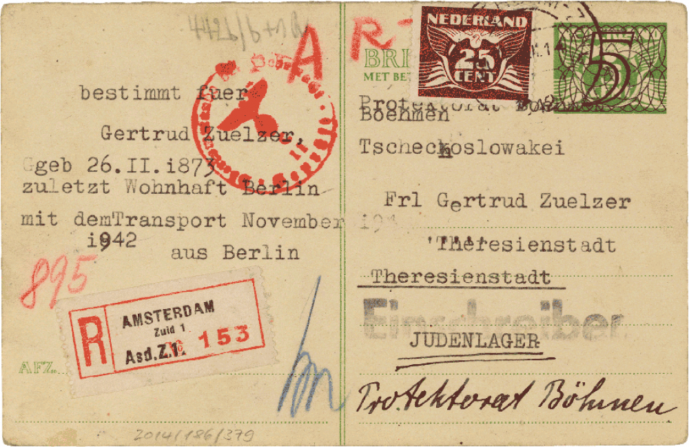 Postcard with printed text and various stamps.