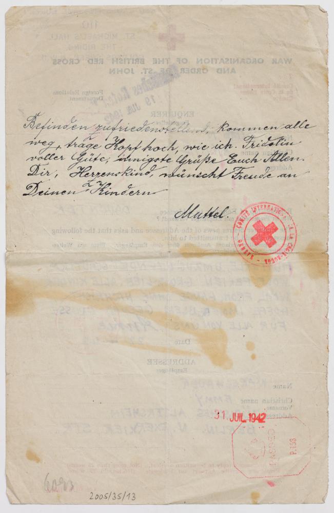 Reverse side of the Red Cross letter with a handwritten note.