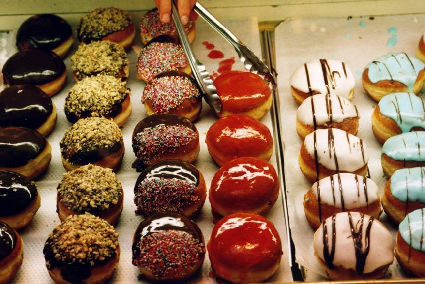 Many colorful doughnuts on display