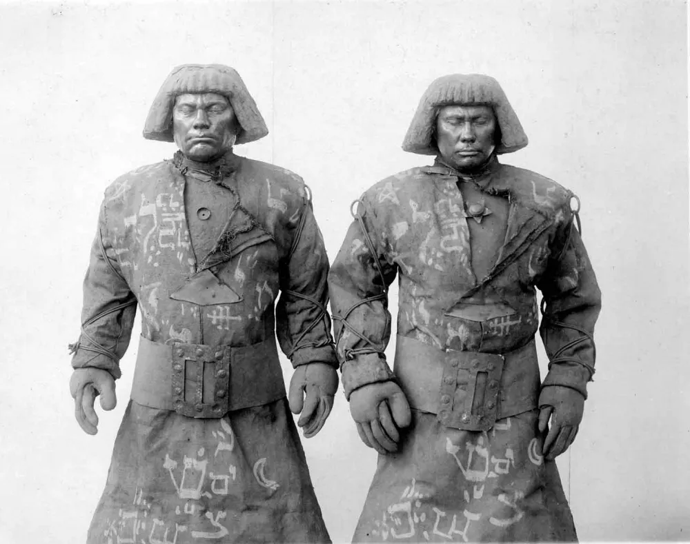 Two nearly identically looking men
