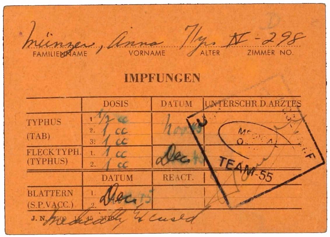 Vaccine certificate for Anna Münzer from the DP camp, with a partly legible stamp from the medical office
