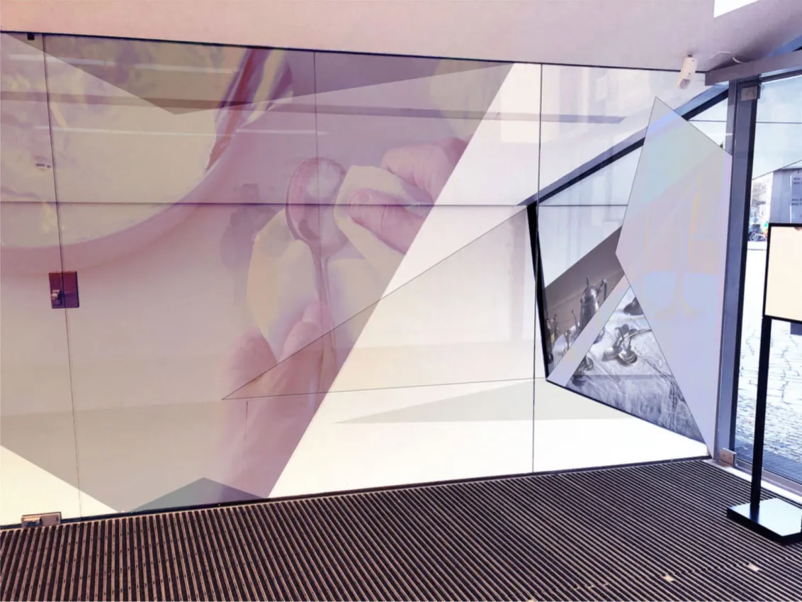Design sketch of a showcase with gray-blue photos of oversized objects.