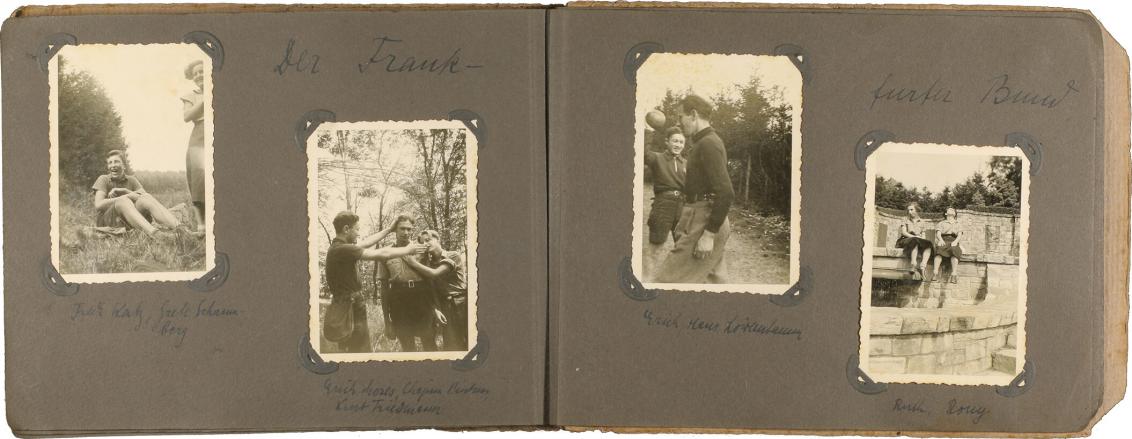 Two-page spread from a photo album. Each page has two black-and-white photographs pasted in, each of which show two to three adolescents on field trips