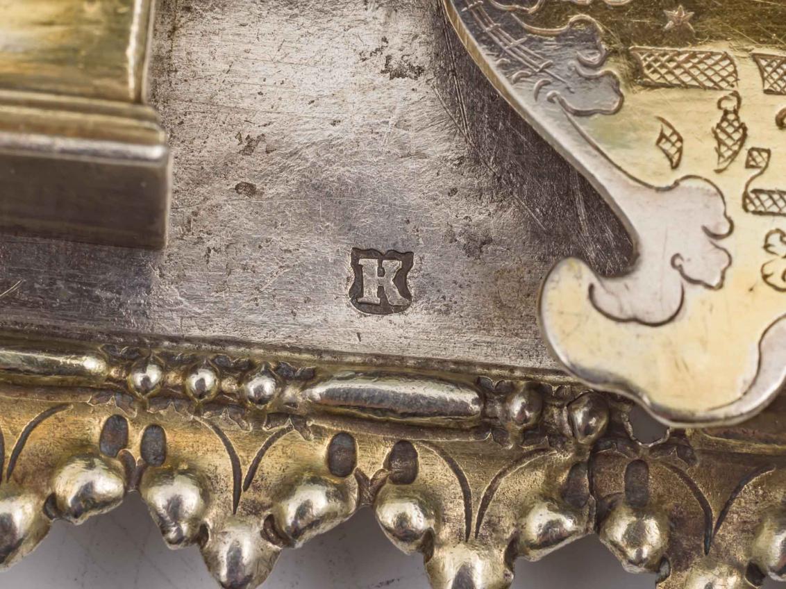 Detail of silver partially gold plated Torah shield with a stamped K
