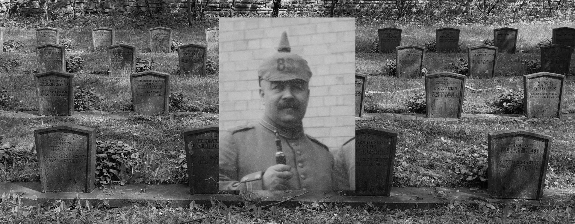 Black and white photo of a cemetery with a portrait photo of a soldier above it.