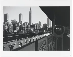 An elevated train station in the New York skyline and the reflection of the photographer with her camera in a small round mirror