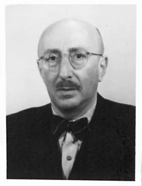 Black-and-white portrait of a bald man with a mustache, glasses, and a bow tie around his neck.