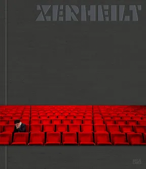 Graues Buchcover mit dem Titel ZERHEILT und einer Banderole mit dem Foto einer Person, die allein in den roten Publikumssitzen eines Theaters sitzt