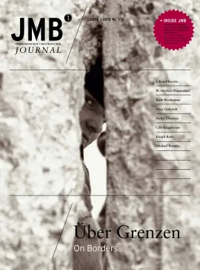 Cover of &ldquo;On Borders&rdquo;, Journal one: a face is peering through a crack in a concrete wall