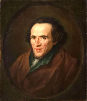 &Ouml;lgem&auml;lde: Portr&auml;t von Moses Mendelssohn im Halbprofil in einem gemalten ovalen Rahmen dargestellt, die Augen sind auf die Betrachtenden gerichtet. 