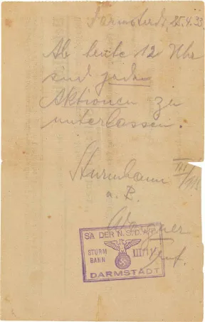 Handwritten note, stamped and signed by SA Troop Leader Wagner. The text reads &ldquo;Darmstadt, 25 April 1933. From noon today, all actions are to stop.&rdquo;