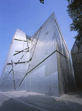 An upward view of the Libeskind Building during a sunny day