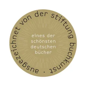 Runde Goldplakette mit der Aufschrift: ausgezeichnet von der Stiftung Buchkunst, eines der sch&ouml;nsten deutschen B&uuml;cher.