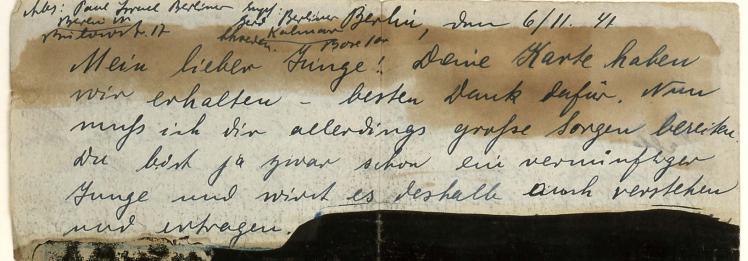 Handwritten letter with blackened sections (detail)