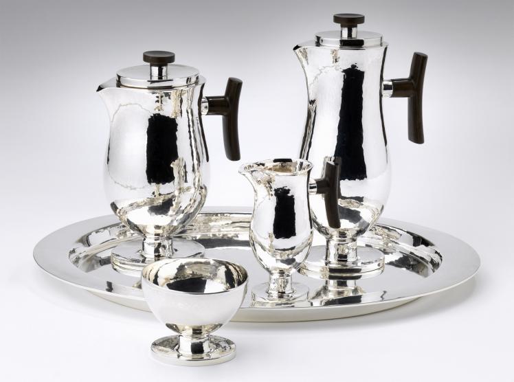 Silver platter with two large kettles, one small milk jug, and a sugar bowl 